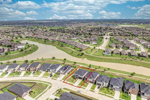 29231 Red Rocks Park Dr, Katy, TX 77494 - aerial view of residential area with property boundaries highlighted and a large body of water