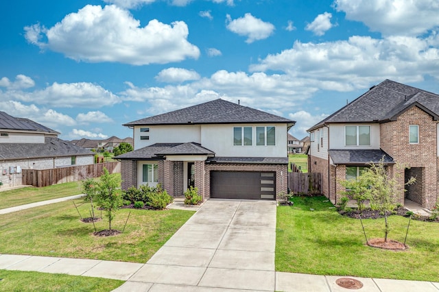 29231 Red Rocks Park Dr, Katy, TX 77494 - view of front of property featuring driveway, an attached garage, brick siding, stucco siding, and a residential view