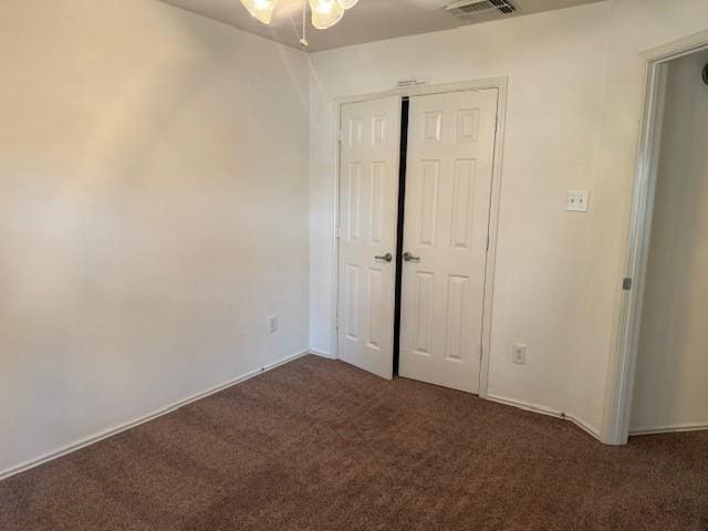 5417 Summer Spring Ln, Rosharon, TX 77583 - unfurnished bedroom featuring dark colored carpet and a closet