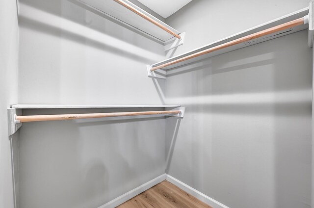 20006 18th Fairway Dr, Humble, TX 77346 - spacious closet featuring light wood-type flooring