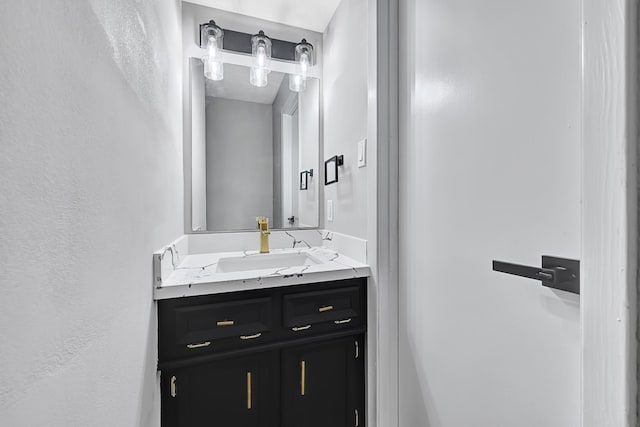 20006 18th Fairway Dr, Humble, TX 77346 - bathroom featuring vanity and a textured wall