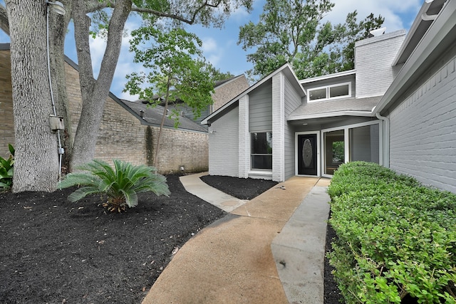 20006 18th Fairway Dr, Humble, TX 77346 - entrance to property featuring brick siding