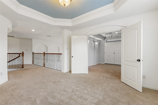 9431 Copper Cove Ln, Rosharon, TX 77583 - carpeted empty room featuring a tray ceiling and crown molding