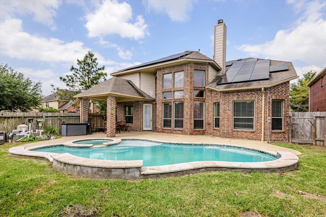 9431 Copper Cove Ln, Rosharon, TX 77583 - view of swimming pool with a patio area and a pool with connected hot tub