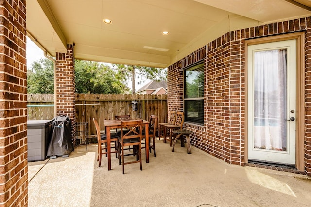 9431 Copper Cove Ln, Rosharon, TX 77583 - view of patio with outdoor dining area