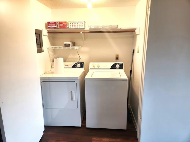 1516 Bay Area Blvd Unit J9, Houston, TX 77058 - laundry room with washer and clothes dryer and dark wood-style flooring