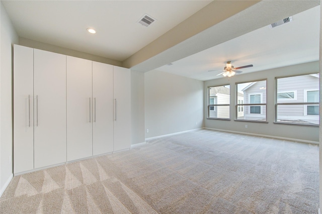 9918 Buckwheat Ln, Houston, TX 77080 - unfurnished bedroom featuring light carpet, baseboards, a ceiling fan, and recessed lighting