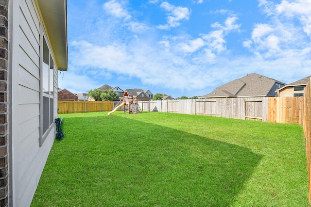 8219 Oxbow Manor Ln, Cypress, TX 77433 - view of yard with a playground and a residential view