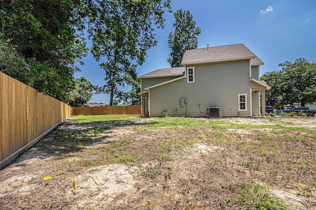 4801 Marquita Ln, Houston, TX 77039 - back of house featuring cooling unit and a fenced backyard