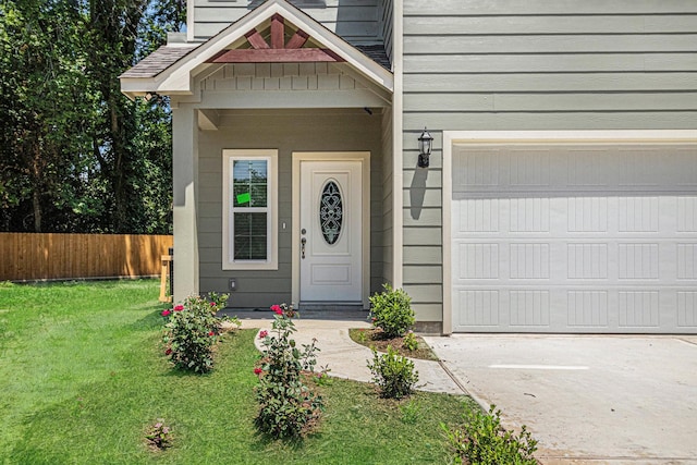 4801 Marquita Ln, Houston, TX 77039 - view of exterior entry with concrete driveway and an attached garage