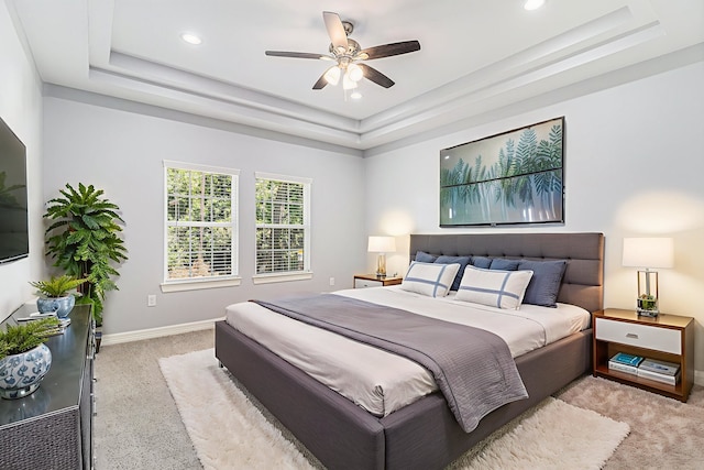 4801 Marquita Ln, Houston, TX 77039 - bedroom featuring light colored carpet, a tray ceiling, recessed lighting, and a ceiling fan