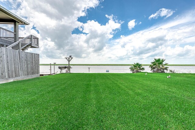 1331 County Road 230, Sargent, TX 77414 - view of green lawn with a water view
