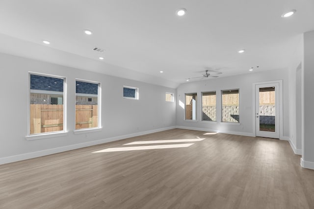 21410 Flora Springs Ln, Magnolia, TX 77355 - spare room with a ceiling fan, recessed lighting, baseboards, and light wood-type flooring