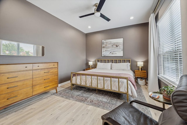 1250 Sampson St, Houston, TX 77003 - bedroom with light wood-style flooring, multiple windows, recessed lighting, lofted ceiling, and a ceiling fan