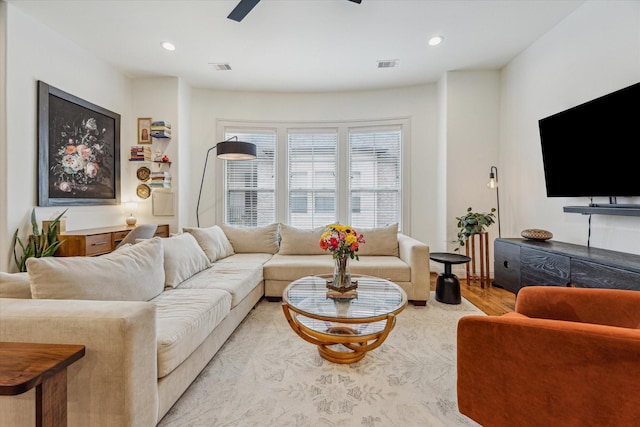1250 Sampson St, Houston, TX 77003 - living room featuring ceiling fan, light wood-type flooring, and recessed lighting