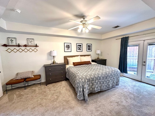 5018 Darling St, Houston, TX 77007 - bedroom featuring light colored carpet, access to outside, french doors, and a ceiling fan