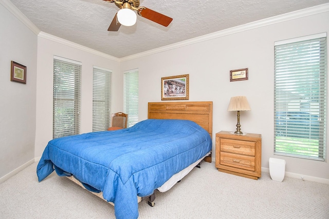 8028 Oakwood Forest Dr, Houston, TX 77040 - bedroom featuring multiple windows, carpet, baseboards, a textured ceiling, and crown molding