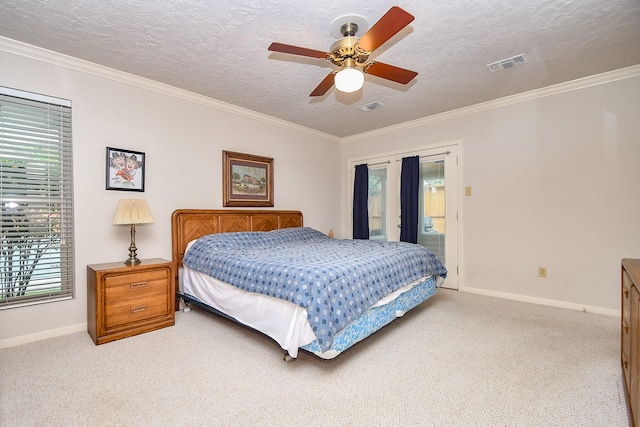 8028 Oakwood Forest Dr, Houston, TX 77040 - bedroom featuring access to outside, baseboards, light carpet, multiple windows, and a textured ceiling