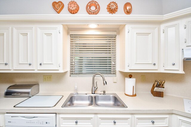 8028 Oakwood Forest Dr, Houston, TX 77040 - kitchen with a sink, light countertops, white dishwasher, and white cabinetry