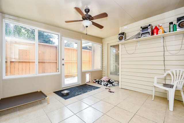 8028 Oakwood Forest Dr, Houston, TX 77040 - unfurnished sunroom with a ceiling fan