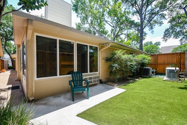 8028 Oakwood Forest Dr, Houston, TX 77040 - view of yard with a patio area and central AC unit
