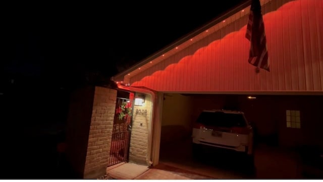 8028 Oakwood Forest Dr, Houston, TX 77040 - property exterior at twilight featuring brick siding
