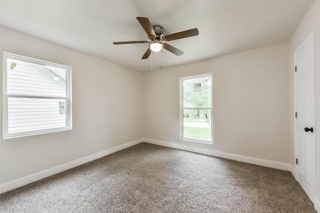 9096 N Comanche Cir, Willis, TX 77378 - carpeted empty room with baseboards and a ceiling fan