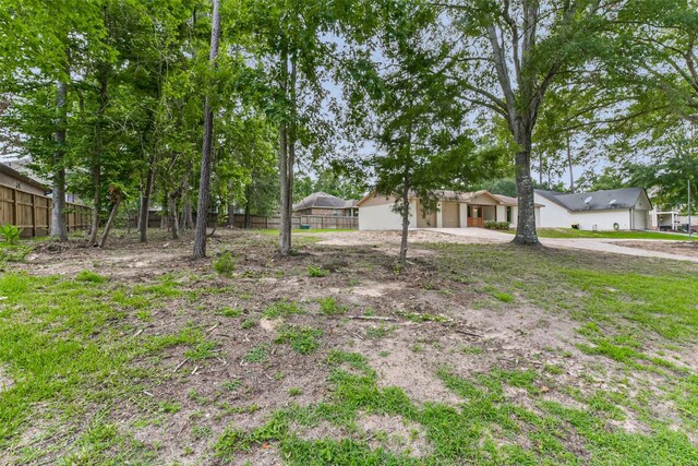 9096 N Comanche Cir, Willis, TX 77378 - view of yard