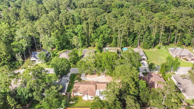 9096 N Comanche Cir, Willis, TX 77378 - view of property location with a forest and nearby suburban area