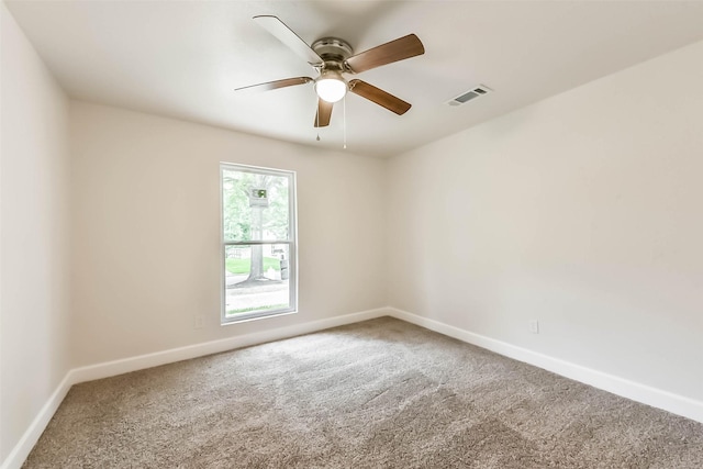 9096 N Comanche Cir, Willis, TX 77378 - empty room with carpet floors, baseboards, and ceiling fan