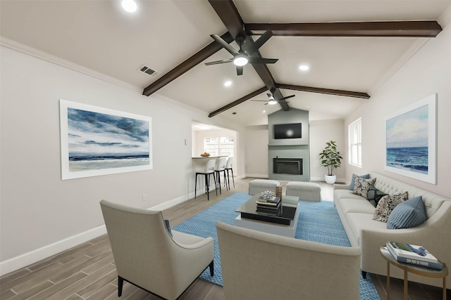 9096 N Comanche Cir, Willis, TX 77378 - living area with a ceiling fan, recessed lighting, baseboards, a fireplace, and healthy amount of natural light