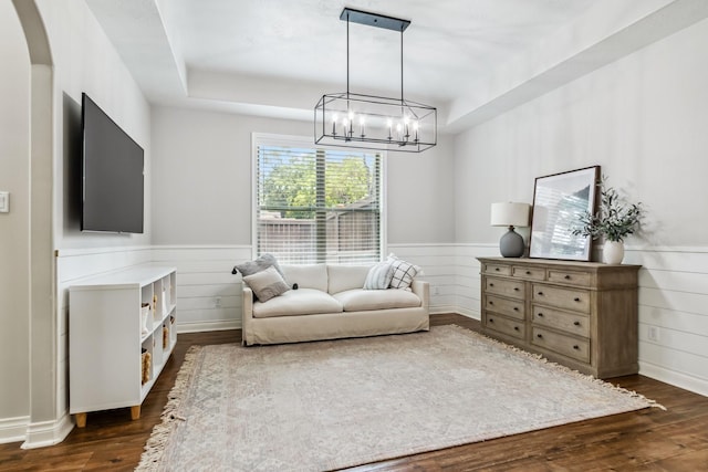 1935 Invermere Dr, Spring, TX 77386 - sitting room featuring a wainscoted wall, dark wood-type flooring, a chandelier, and a raised ceiling