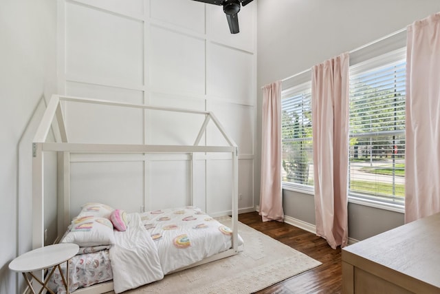 1935 Invermere Dr, Spring, TX 77386 - bedroom featuring dark wood finished floors and a ceiling fan