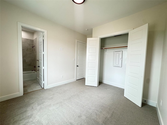 1307 71st St Unit A, Houston, TX 77011 - unfurnished bedroom featuring carpet floors, a closet, and ensuite bath