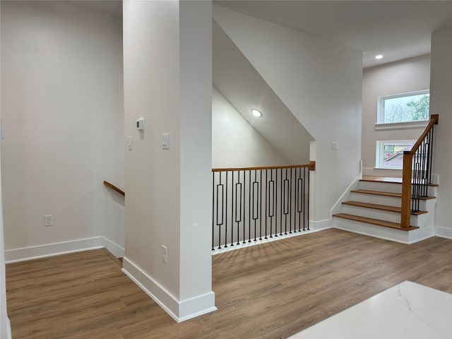 1307 71st St Unit A, Houston, TX 77011 - stairway with wood finished floors and recessed lighting
