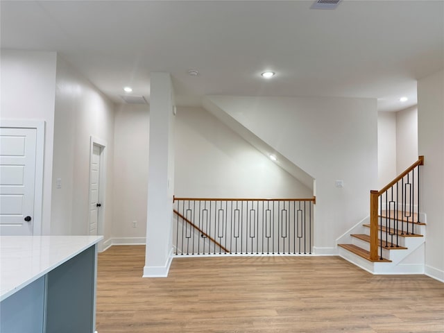 1307 71st St Unit A, Houston, TX 77011 - hall with light wood-style flooring, recessed lighting, and baseboards
