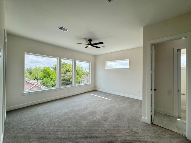 1307 71st St Unit A, Houston, TX 77011 - unfurnished bedroom with carpet floors and ceiling fan