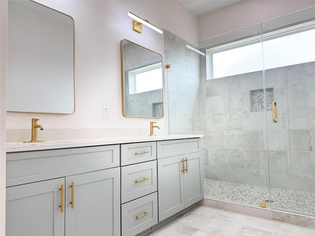 1307 71st St Unit A, Houston, TX 77011 - full bathroom featuring a stall shower and double vanity