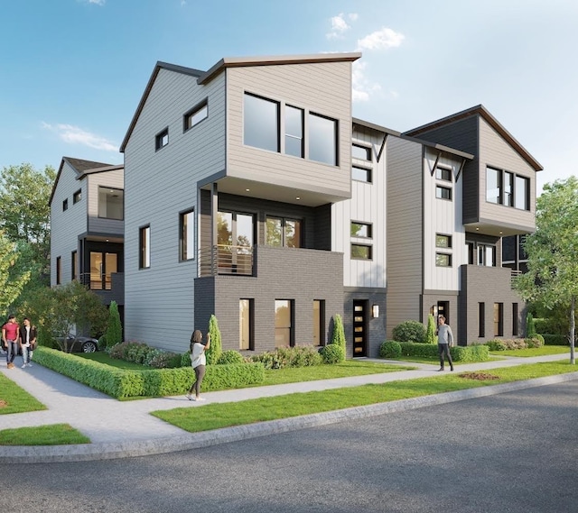 1307 71st St Unit A, Houston, TX 77011 - view of front of property featuring board and batten siding