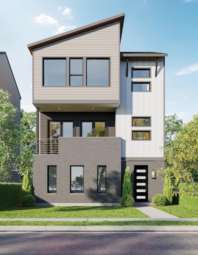 1307 71st St Unit A, Houston, TX 77011 - contemporary home featuring brick siding and board and batten siding