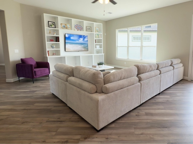 1214 Hidden Oaks Dr, Tomball, TX 77375 - living area featuring a ceiling fan, baseboards, and wood finished floors