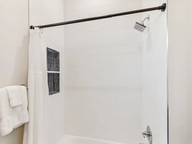22906 Miramar St, Galveston, TX 77554 - full bathroom featuring shower / tub combo