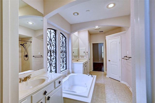 21814 Canton Pass Ln, Katy, TX 77450 - full bath featuring a bath, vanity, tile patterned floors, and baseboards