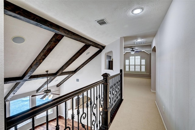 21814 Canton Pass Ln, Katy, TX 77450 - hallway featuring baseboards, beamed ceiling, a textured ceiling, carpet floors, and recessed lighting