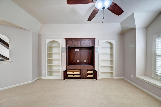 21814 Canton Pass Ln, Katy, TX 77450 - unfurnished living room featuring light carpet, baseboards, a ceiling fan, and healthy amount of natural light