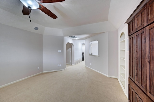 21814 Canton Pass Ln, Katy, TX 77450 - unfurnished room featuring light colored carpet, arched walkways, baseboards, and ceiling fan