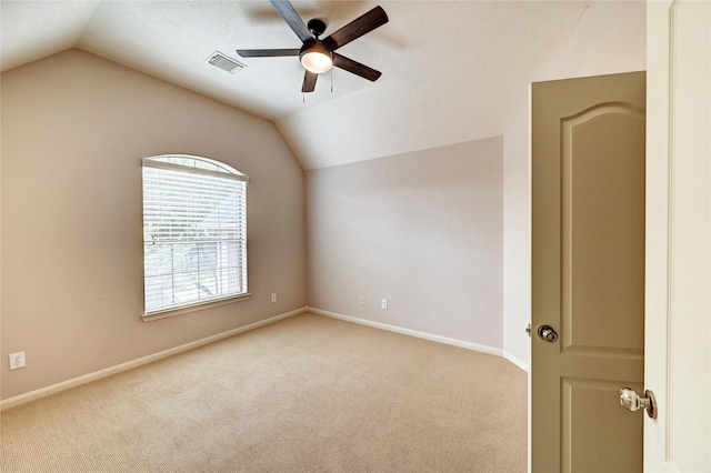 21814 Canton Pass Ln, Katy, TX 77450 - unfurnished room featuring vaulted ceiling, a ceiling fan, carpet floors, and baseboards