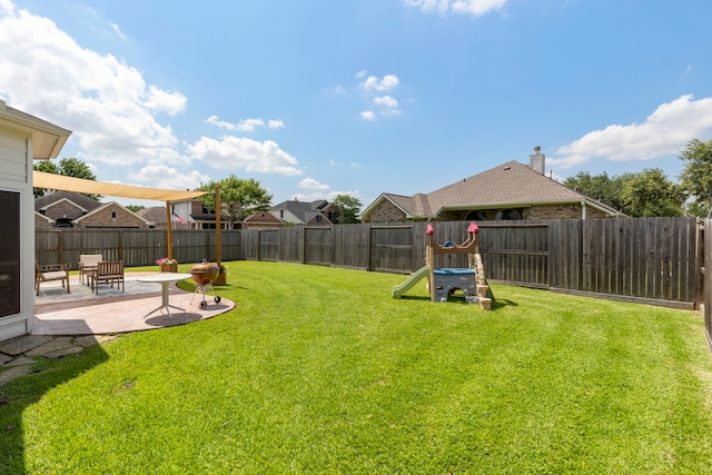 4613 Meridian Park Dr, Pearland, TX 77584 - view of yard with a patio and a playground