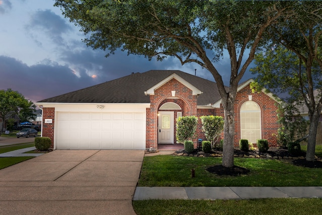 4613 Meridian Park Dr, Pearland, TX 77584 - view of front of property with brick siding, concrete driveway, an attached garage, roof with shingles, and a yard