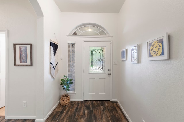 4613 Meridian Park Dr, Pearland, TX 77584 - foyer entrance with arched walkways, wood finished floors, and baseboards